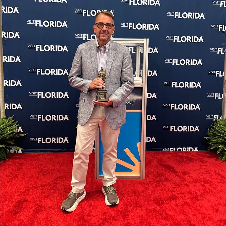 Jay Tusa accepting the 2025 Gold Flagler Award